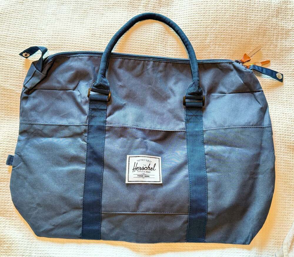 Brand New Herschel Travel Tote w/trolley sleeve Black